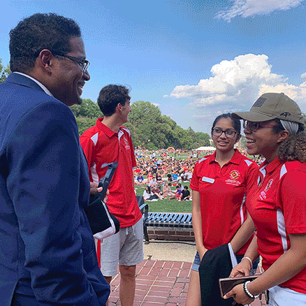 Multiple images of President Pines posing with members of the university community